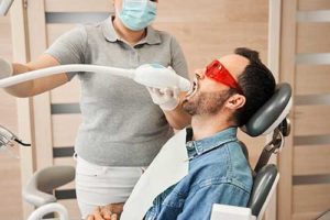 man gets his teeth whitened 