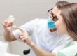 doctor looks at single tooth implants