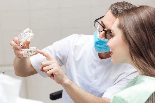What is a Single Tooth Implant doctor looks at single tooth implants